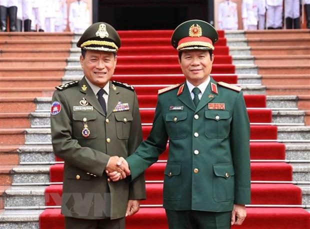 越南柬埔寨两国军队加强团结与友好合作 - Ảnh 2.