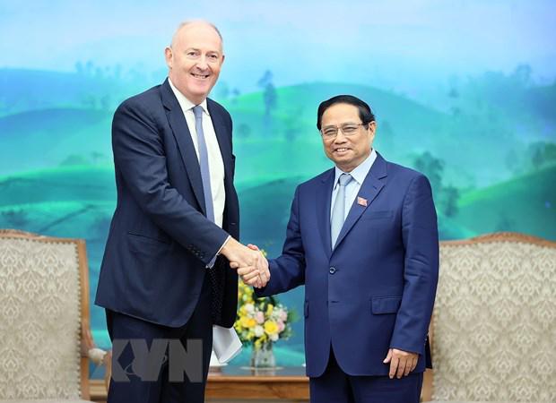 越南政府总理范明正会见外国企业领导 - Ảnh 1.
