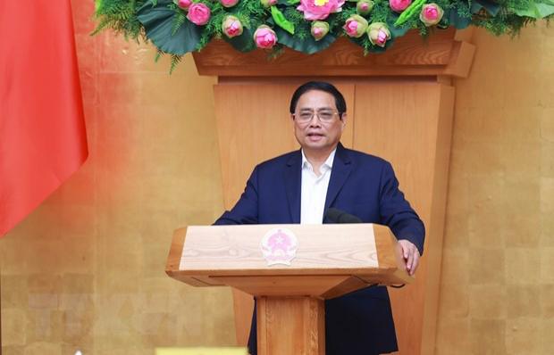 范明正总理主持召开2月份政府定期会议 - Ảnh 1.