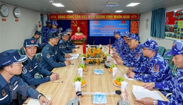 越南海警与中国海警在北部湾海域举行联合巡逻活动 - Ảnh 1.