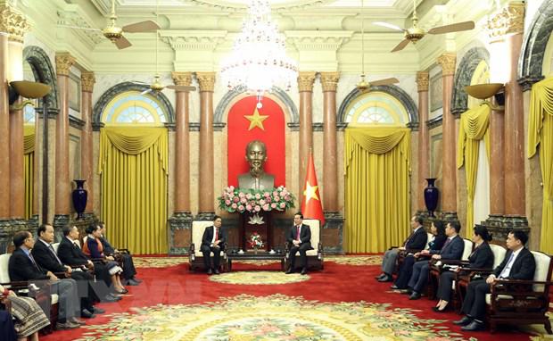 越南国家主席武文赏会见老挝建国阵线中央委员会主席辛拉冯·库派吞 - Ảnh 1.