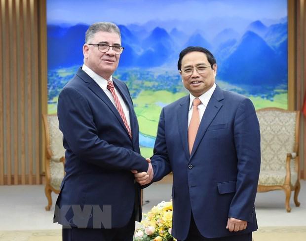 越南愿协助古巴保障粮食安全和发展渔业 - Ảnh 1.