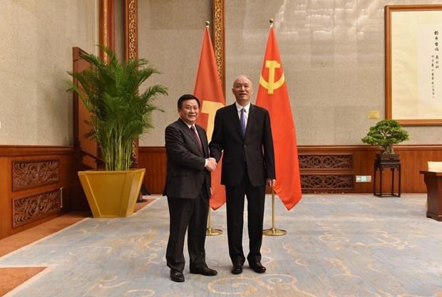 越共中央政治局委员、中央理论委员会主任阮春胜访问中国 - Ảnh 2.