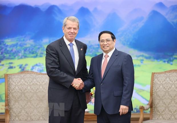 政府总理范明正会见外国客人 - Ảnh 1.