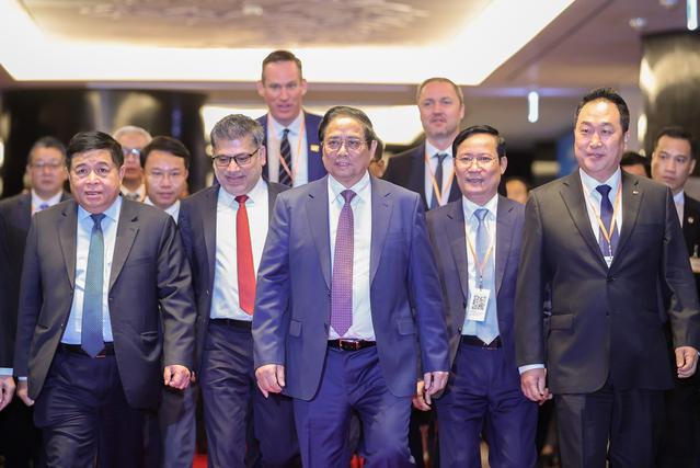 越南政府总理范明正出席外资企业见面会暨2024年度越南企业论坛- Ảnh 1.