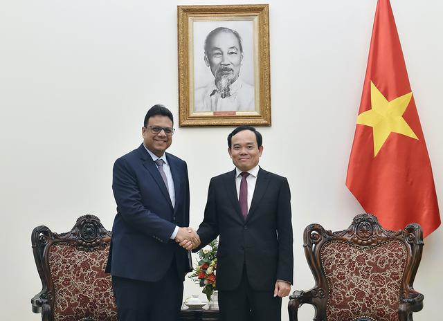 陈流光副总理建议美国尽早承认越南市场经济地位- Ảnh 1.