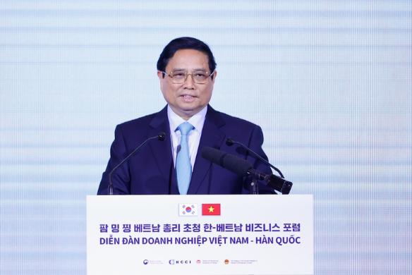 政府总理范明正出席越南韩国企业论坛- Ảnh 1.