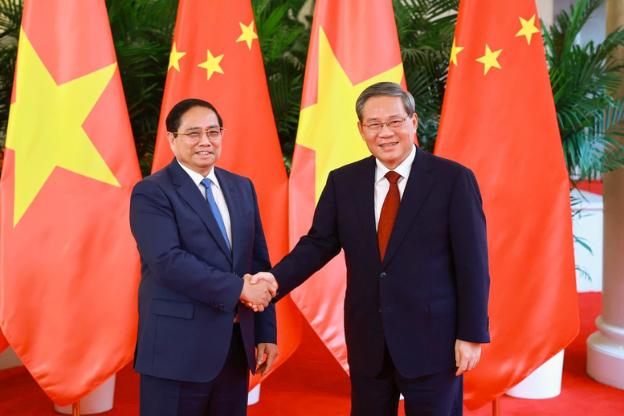 范明正总理同中国国务院总理李强举行会谈- Ảnh 1.