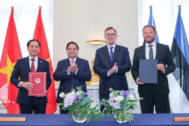 政府总理范明正与爱沙尼亚总理克里斯汀•米哈尔举行会谈- Ảnh 3. 政府总理范明正与爱沙尼亚总理克里斯汀•米哈尔举行会谈- Ảnh 3.