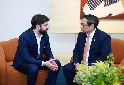 范明正总理会见智利总统- Ảnh 1.