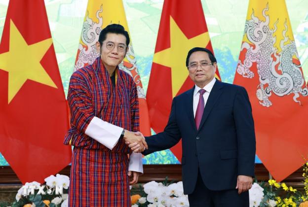 越南政府总理范明正会见不丹国王吉格梅- Ảnh 1.