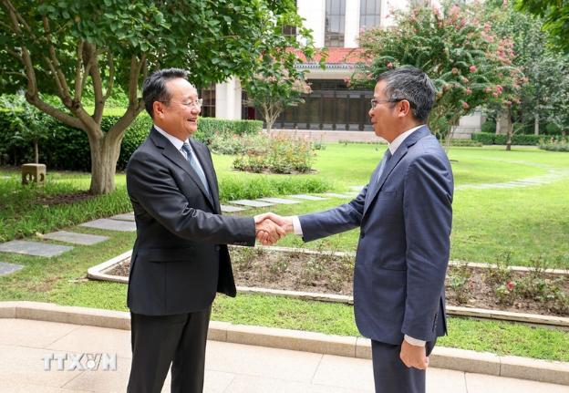 越南驻华大使范清平会见中共中央宣传部副部长王纲- Ảnh 1.
