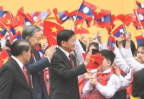 苏林总书记主持仪式 欢迎老挝人民革命党中央总书记、国家主席通伦访越- Ảnh 3.