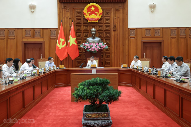 黎明兴总理主持召开会议听取关于2027年APEC年筹备进度的汇报 - Ảnh 1.