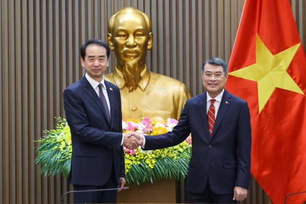 越南政府总理黎明兴会见中国驻越大使何炜- Ảnh 1.
