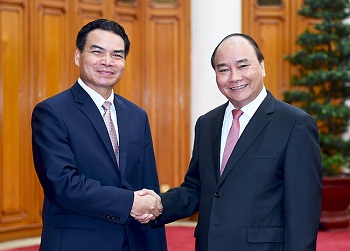 PM receives Lao minister, Chinese JA Solar Group chairman