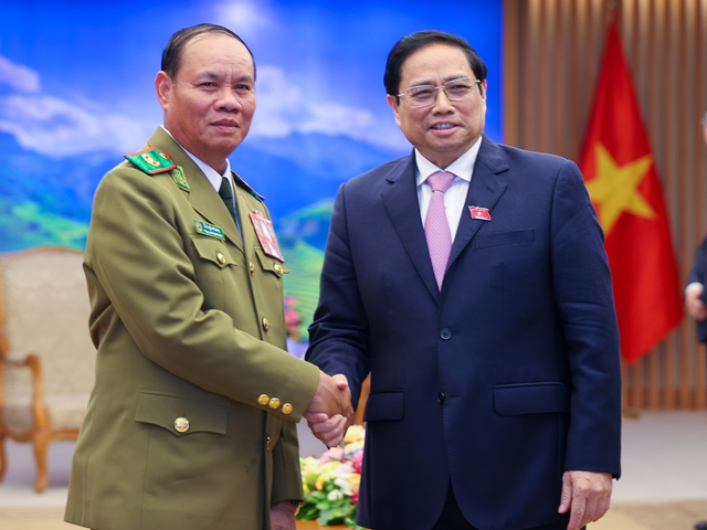 Tăng cường hợp tác an ninh Việt - Lào trong bối cảnh nhiều biến động, khó khăn, thách thức - Ảnh 1.