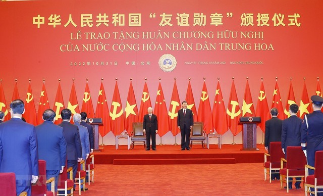 Tổng Bí thư, Chủ tịch nước CHND Trung Hoa Tập Cận Bình trao Huân chương Hữu nghị tặng Tổng Bí thư Nguyễn Phú Trọng - Ảnh 1.