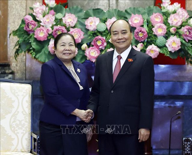 Chủ tịch nước tiếp Đoàn đại biểu cấp cao Ban Tổ chức Trung ương Đảng NDCM Lào - Ảnh 1.