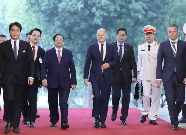 Chùm ảnh: Thủ tướng Phạm Minh Chính chủ trì lễ đón chính thức Thủ tướng CHLB Đức - Ảnh 1.