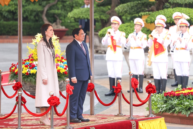 Chùm ảnh: Thủ tướng Phạm Minh Chính chủ trì lễ đón chính thức Thủ tướng New Zealand - Ảnh 4.