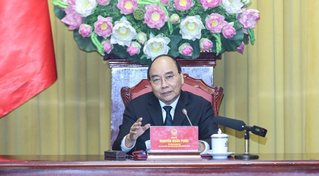 Chủ tịch nước Nguyễn Xuân Phúc tiếp các nhà khoa học dự Hội nghị Liên đoàn Các hội kinh tế ASEAN - Ảnh 1.