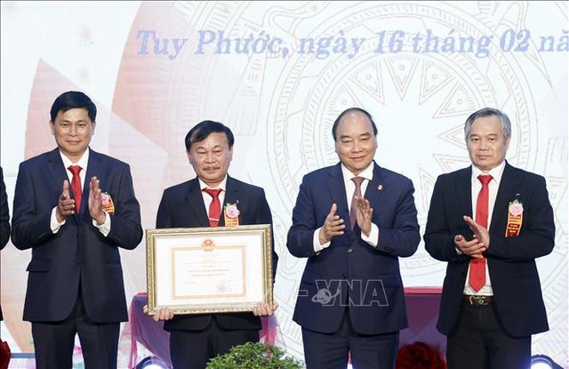 Chủ tịch nước dự Lễ công bố huyện Tuy Phước đạt chuẩn nông thôn mới - Ảnh 1.