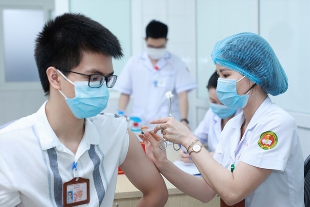 Thực hiện hiệu quả, an toàn, khoa học Chiến dịch tiêm chủng vaccine phòng COVID-19 - Ảnh 1. Thực hiện hiệu quả, an toàn, khoa học Chiến dịch tiêm chủng vaccine phòng COVID-19 - Ảnh 1.