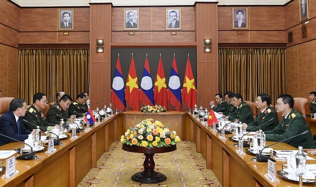 Đoàn đại biểu Quân sự cấp cao QĐND Lào thăm chính thức Việt Nam - Ảnh 1.