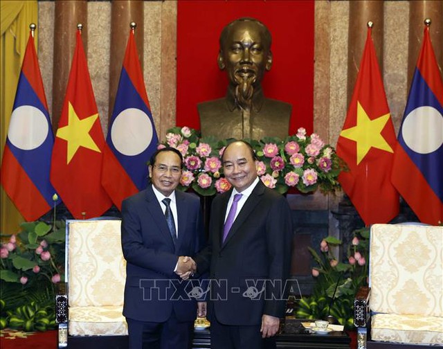 Chủ tịch nước Nguyễn Xuân Phúc tiếp Phó Chủ tịch nước Cộng hoà dân chủ Nhân dân Lào - Ảnh 1.