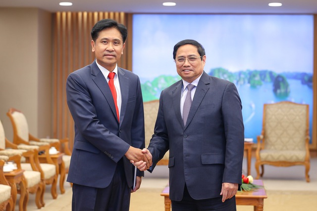Thủ tướng Phạm Minh Chính tiếp Bộ trưởng Tư pháp Lào - Ảnh 1.