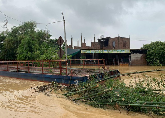 Nhiều địa phương khẩn trương khắc phục hậu quả mưa lũ - Ảnh 5.