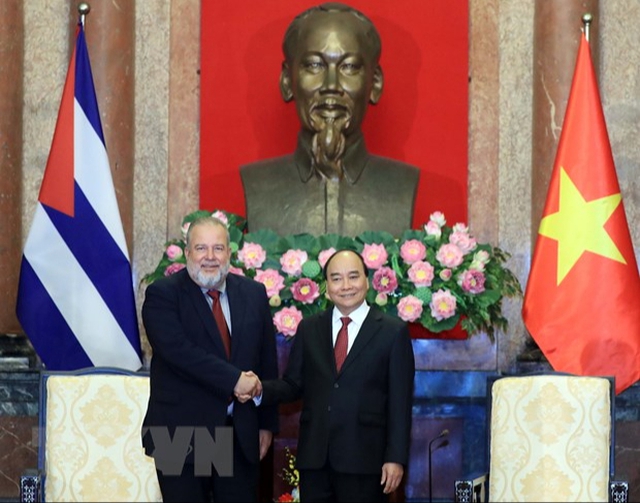 Chủ tịch nước Nguyễn Xuân Phúc hội kiến Thủ tướng nước Cộng hòa Cuba  Manuel Marrero Cruz - Ảnh 1.