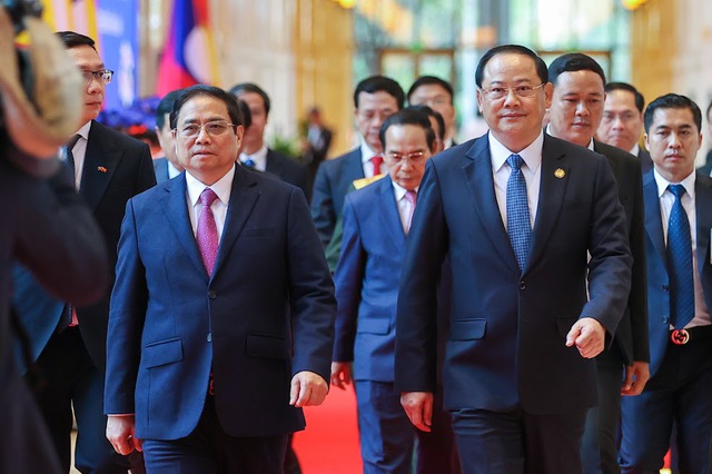 Việt Nam và Lào quyết tâm nâng tầm hợp tác kinh tế, mở rộng không gian hợp tác và phát triển - Ảnh 2.
