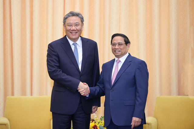 Thủ tướng Phạm Minh Chính tiếp Bộ trưởng Bộ Thương mại Trung Quốc- Ảnh 1.