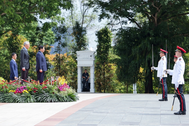 Chùm ảnh: Lễ đón Thủ tướng Phạm Minh Chính thăm chính thức Singapore - Ảnh 2.