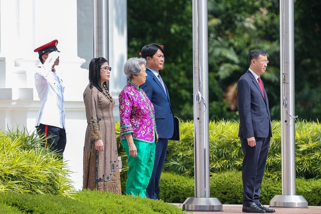 Chùm ảnh: Lễ đón Thủ tướng Phạm Minh Chính thăm chính thức Singapore - Ảnh 4.