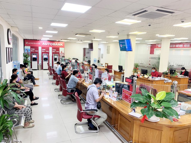 Agribank giảm tiếp 0,5% lãi suất cho vay - Ảnh 1.