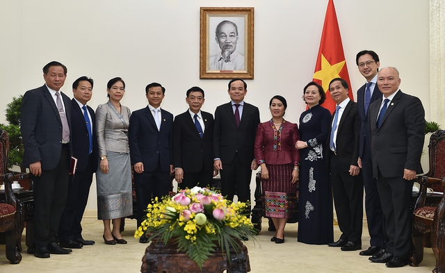 Phó Thủ tướng Trần Lưu Quang tiếp Bộ trưởng Nội vụ Lào - Ảnh 2.