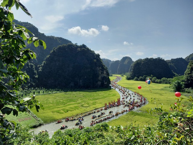 Trải nghiệm 'Sắc vàng Tam Cốc Tràng An' với Tuần lễ Du lịch Ninh Bình 2023 - Ảnh 1.