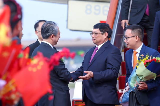 Thủ tướng Phạm Minh Chính tới Bắc Kinh, bắt đầu thăm chính thức Trung Quốc và dự Diễn đàn Kinh tế thế giới - Ảnh 6.