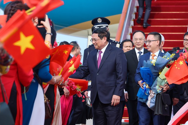 Thủ tướng Phạm Minh Chính tới Bắc Kinh, bắt đầu thăm chính thức Trung Quốc và dự Diễn đàn Kinh tế thế giới - Ảnh 7.