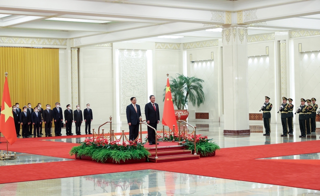 Chùm ảnh: Lễ đón chính thức Thủ tướng Phạm Minh Chính thăm Trung Quốc - Ảnh 3.