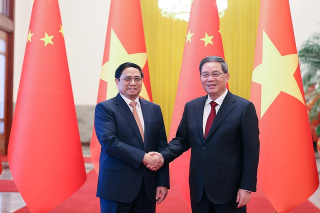 Chùm ảnh: Lễ đón chính thức Thủ tướng Phạm Minh Chính thăm Trung Quốc - Ảnh 1.