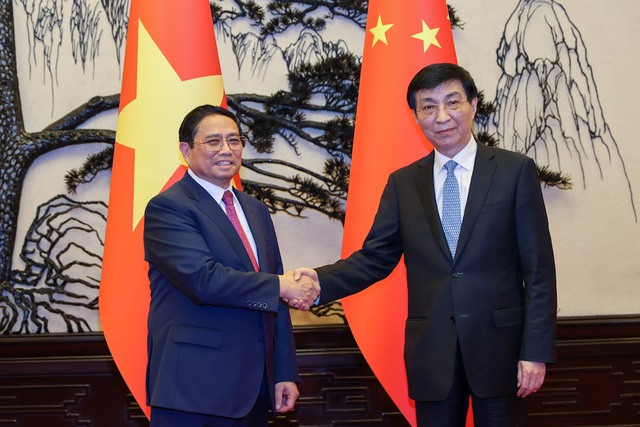 Thủ tướng Chính phủ Phạm Minh Chính hội kiến Chủ tịch Chính hiệp toàn quốc Trung Quốc Vương Hộ Ninh   - Ảnh 1.