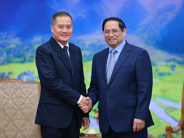 Thủ tướng Phạm Minh Chính tiếp Tổng giám đốc Thông tấn xã Pathet Lào - Ảnh 1.
