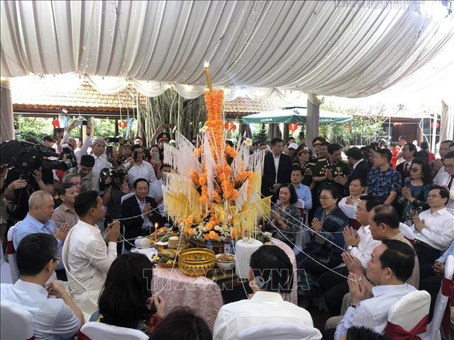 Lãnh đạo Đảng, Nhà nước tham dự lễ đón Tết cổ truyền Bunpimay của Lào- Ảnh 1.