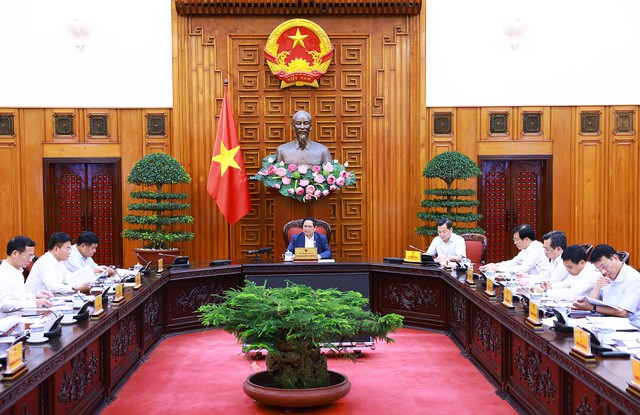 Thủ tướng Phạm Minh Chính chủ trì cuộc họp về chính sách tiền tệ, chính sách tài khóa- Ảnh 1.