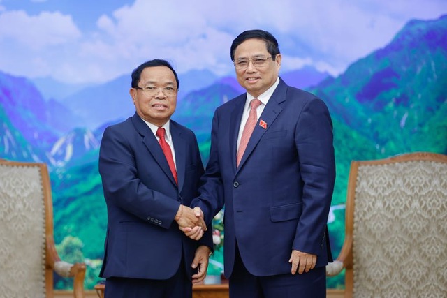 Thủ tướng Phạm Minh Chính tiếp Chủ nhiệm Ban Kiểm tra Trung ương, Tổng Thanh tra Nhà nước Lào- Ảnh 1.