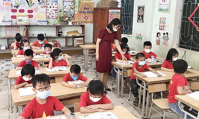 PM urges early physical school resumption after Tet holidays - Ảnh 1.